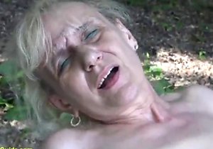 Wrinkly bitch doing kinky things for the camera